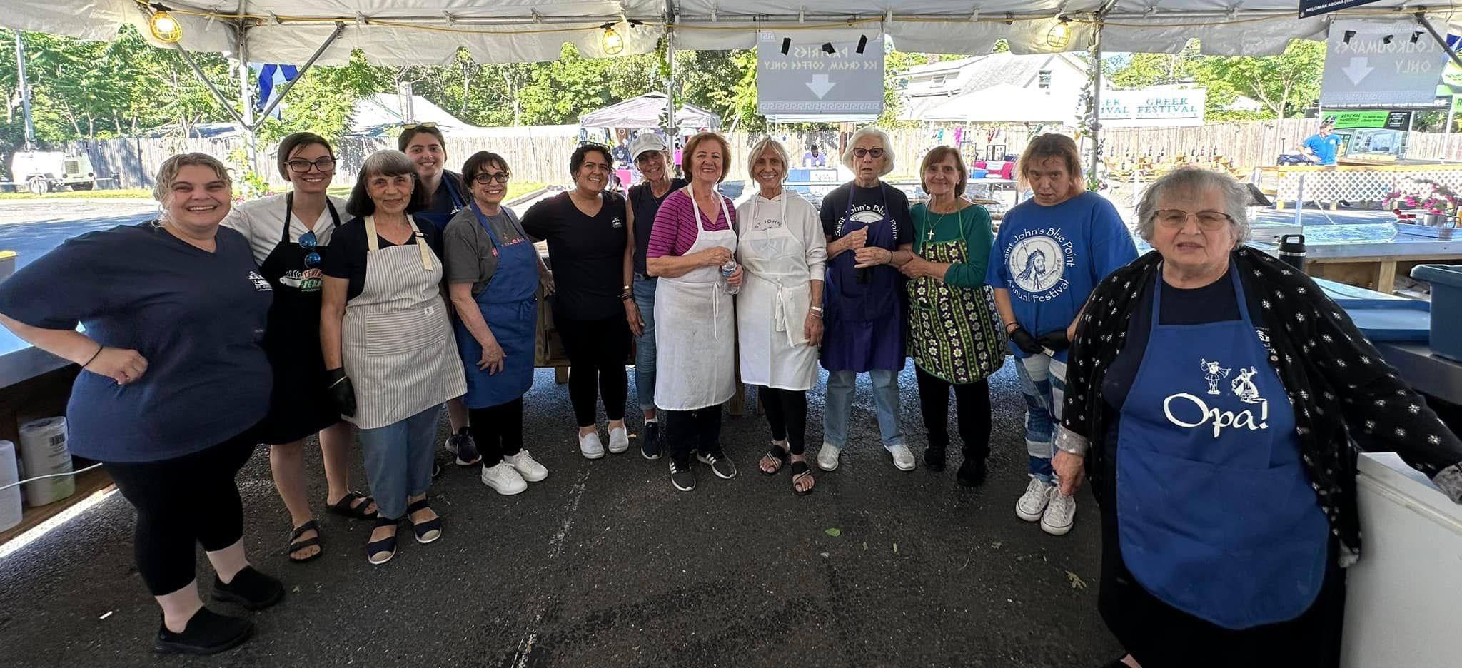 Philoptochos volunteering at St. John's Greek Festival